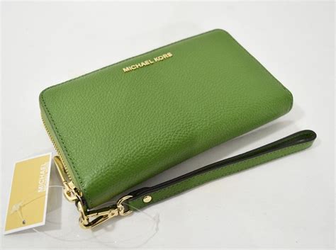 michael kors mercer large smartphone wristlet|Large Leather Smartphone Wristlet .